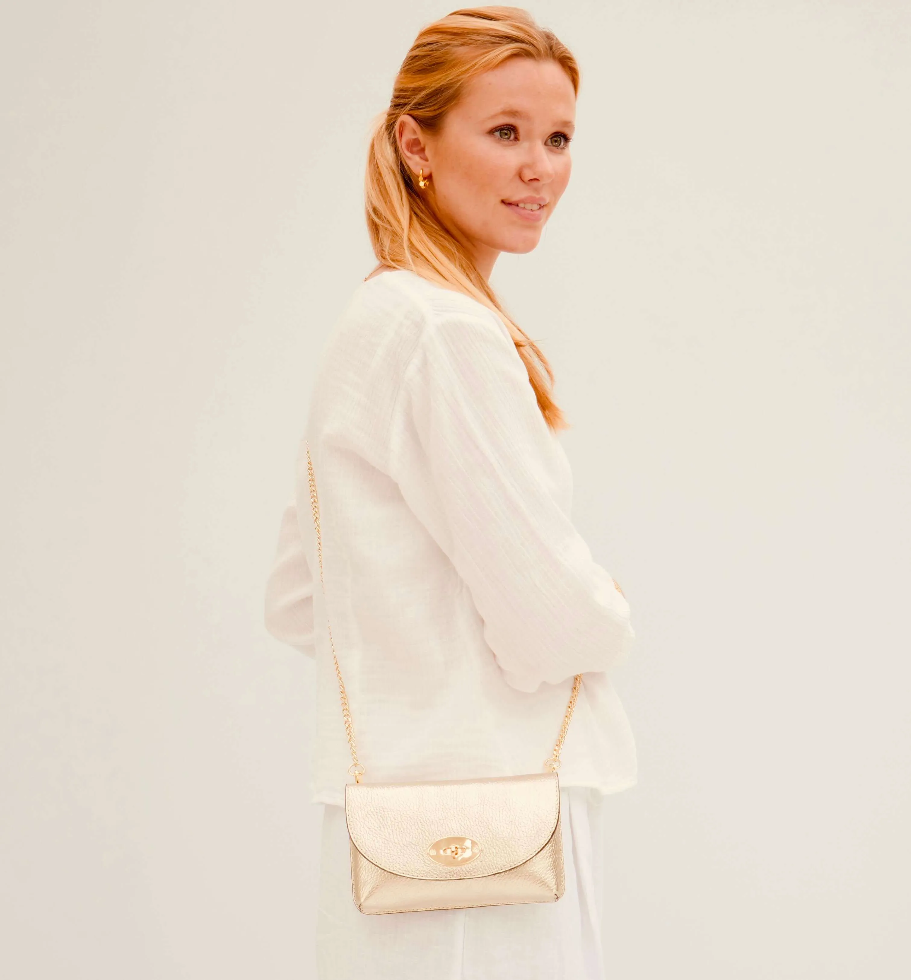 The Mila Gold Leather Phone Bag